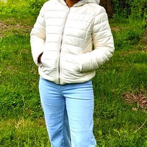 New white jacket with fleece layer inside.